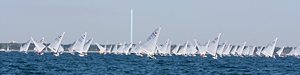 The Fleet of OK dinghies downwind